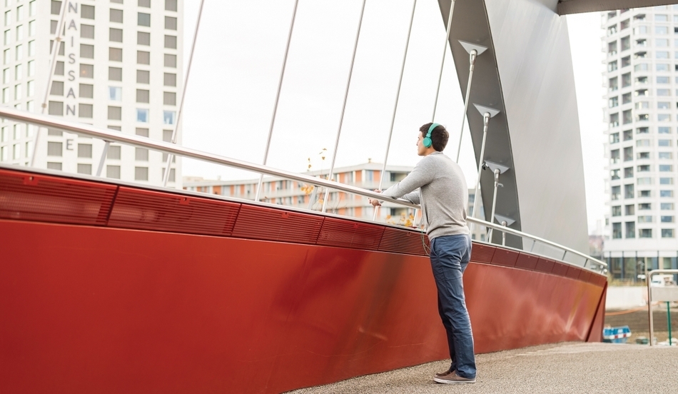 Young man on a bridge